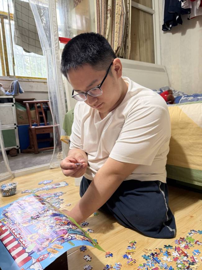 “板凳男孩”高考586分 十五年坚持终获回报